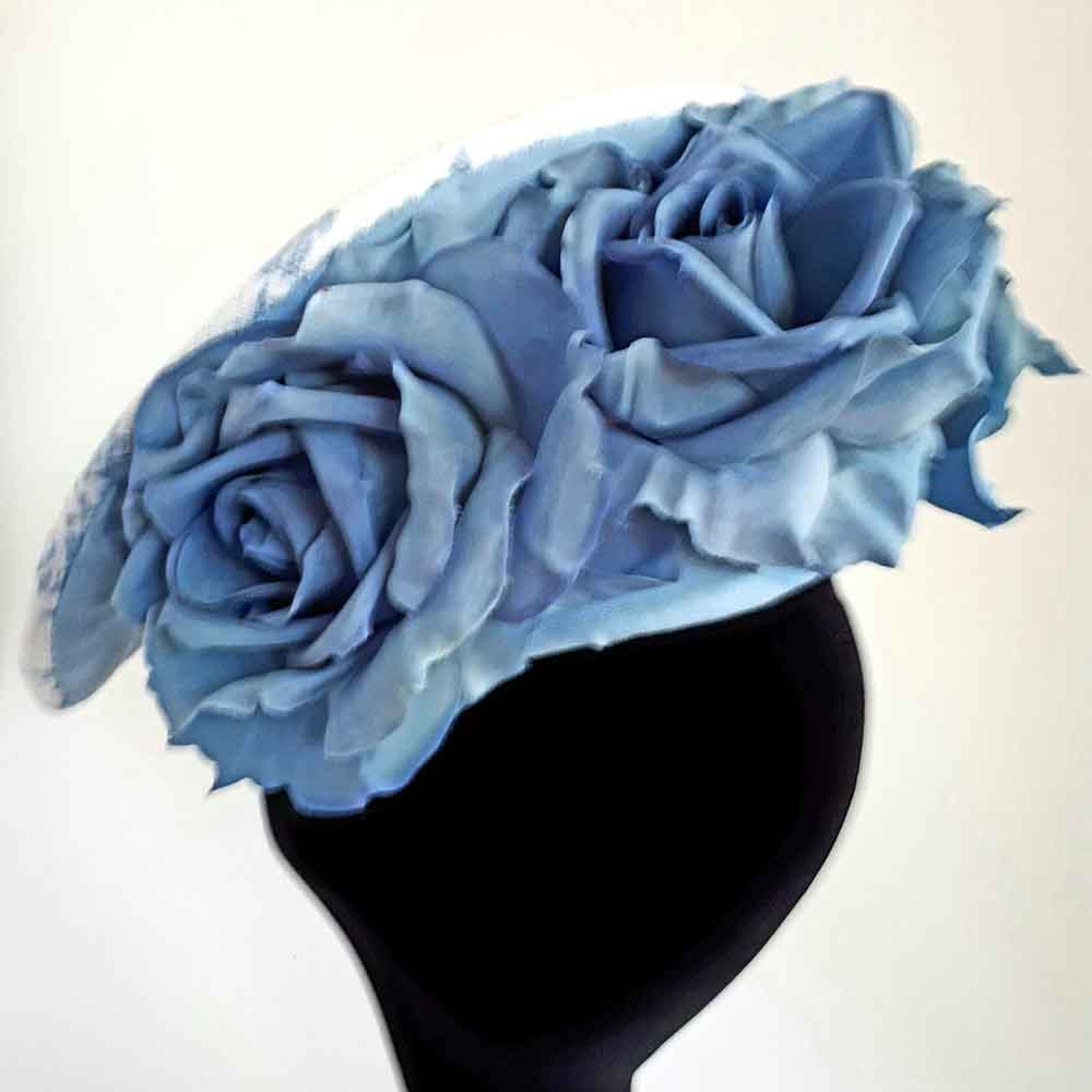 blue floral tilted hat flowers