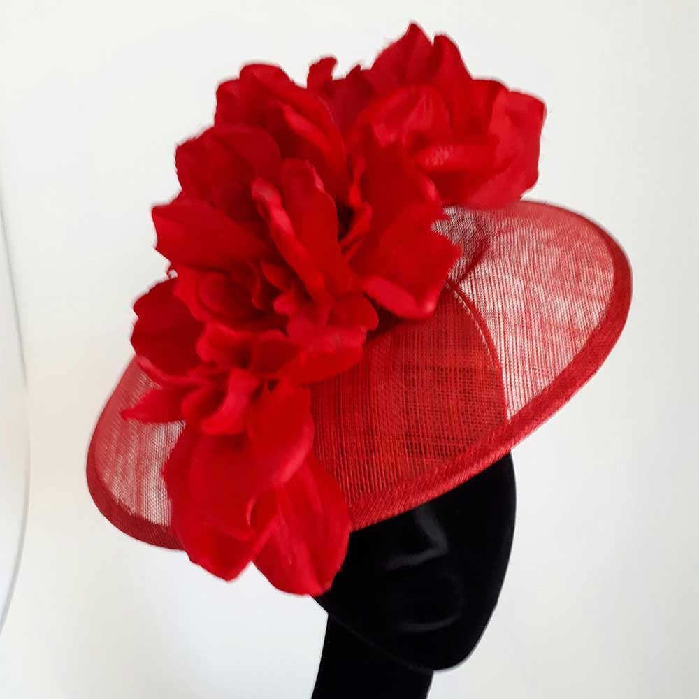 Red sinamay hat with cascading floral design 